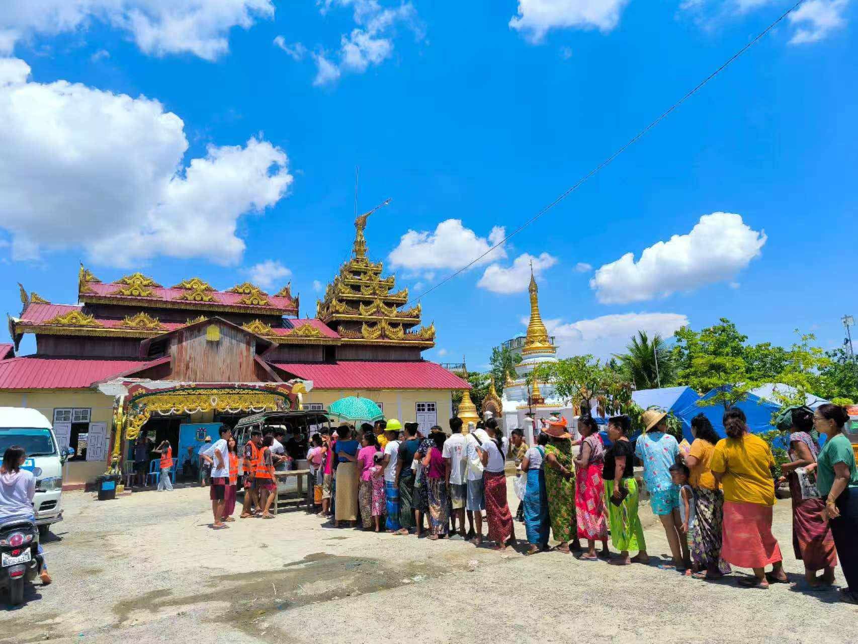 Volunteers serving hot meals after the Myanmar earthquake